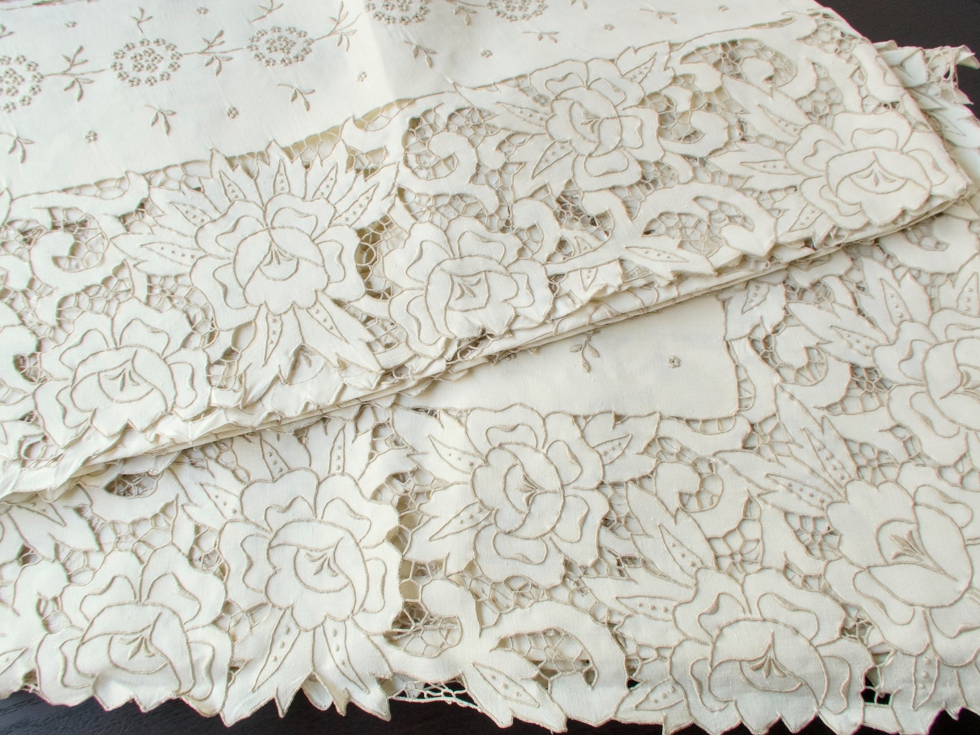 Accurate color tone of The Grand Madeira tablecloth, photographed in late-afternoon light to show true ivory hue.