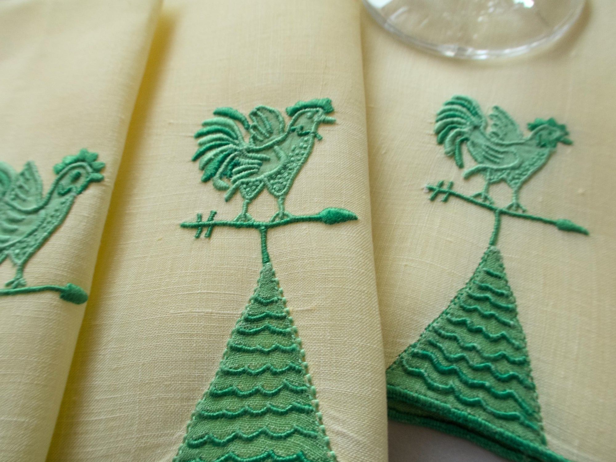 Vintage Marghab Weathervane cocktail napkins, green embroidery on light yellow linen with rooster motif, handmade in Madeira.