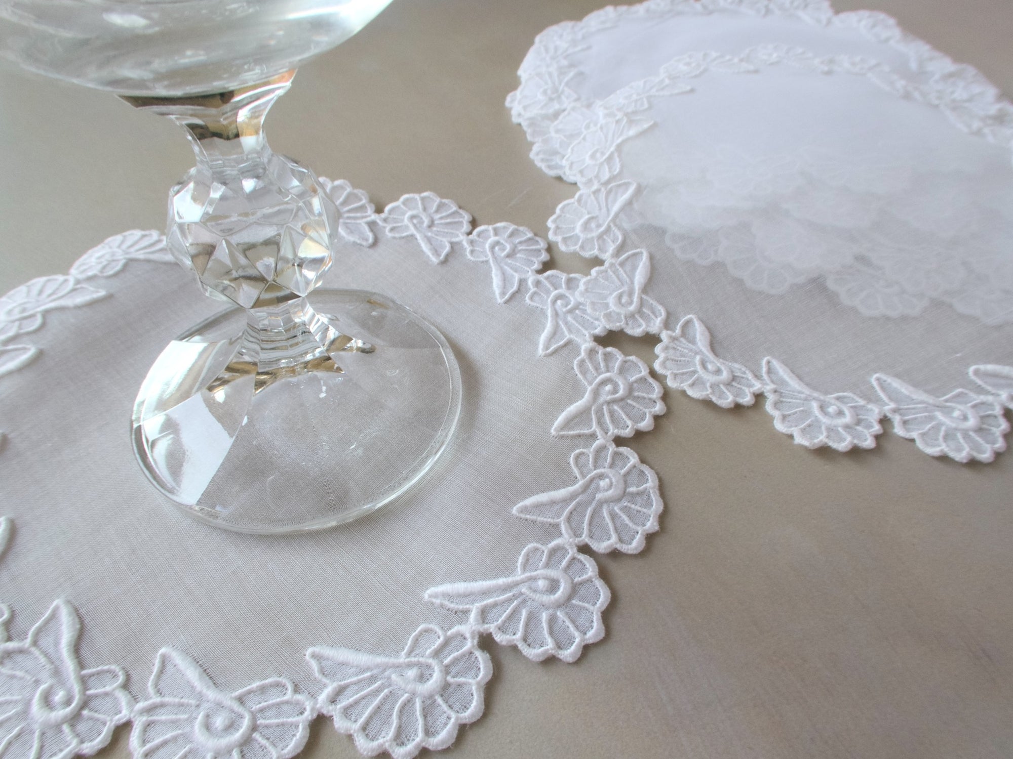 Vintage Marghab Shell pattern cocktail rounds, white hand embroidery on organdy with scalloped edges and fine Madeira detail.