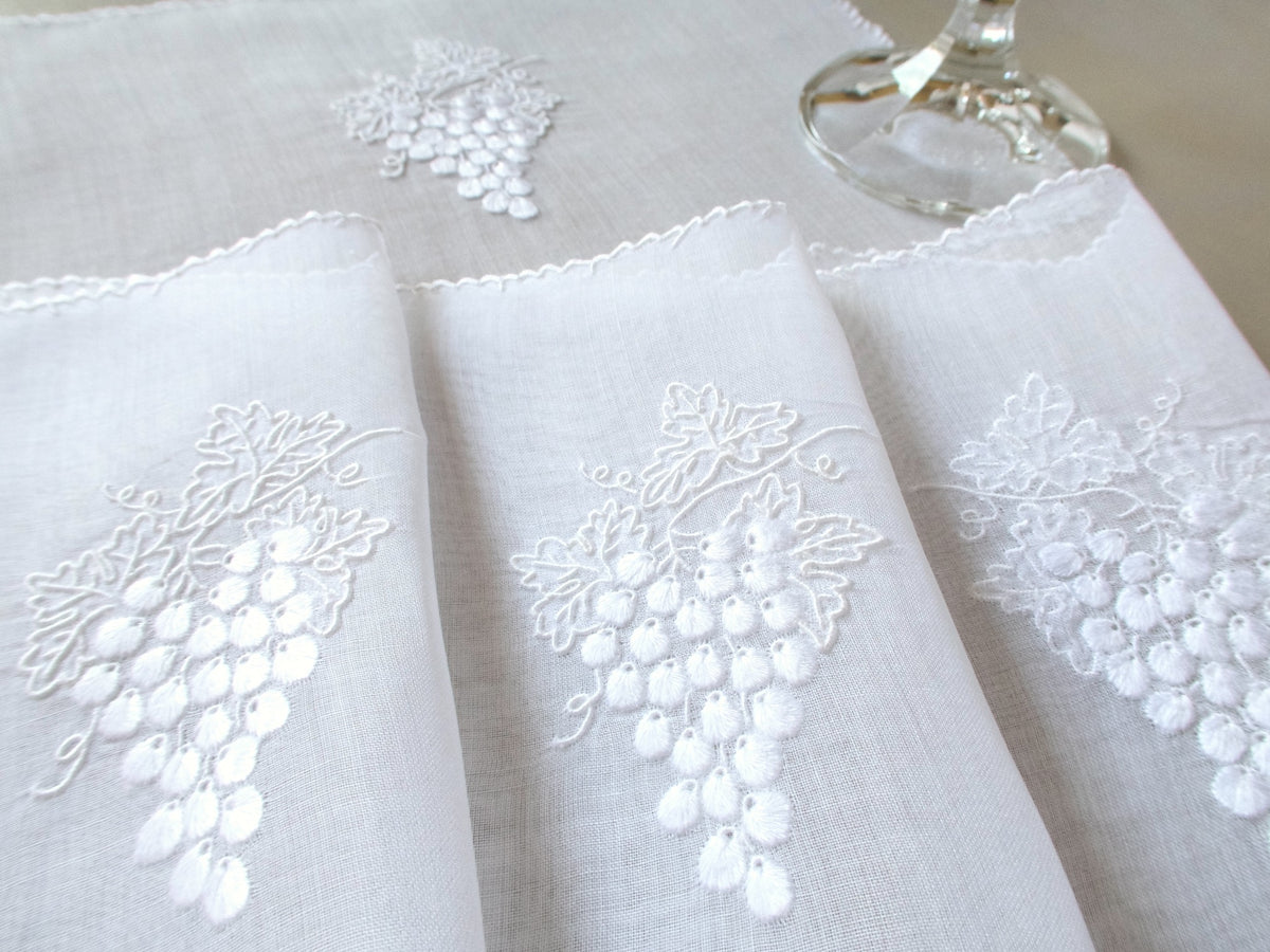 White Marghab Grape &amp; Leaf cocktail napkin, hand embroidered on sheer organdy with raised grape cluster design.