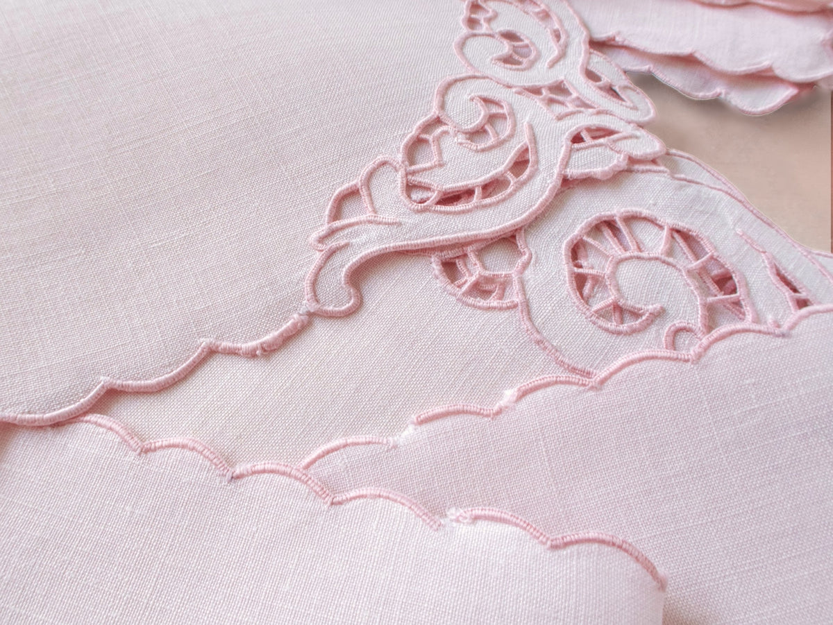 Detail of vintage Madeira pink Irish linen showing Richelieu cutwork scrollwork border and condition disclosure​​​​​​​​​​​​​​​​