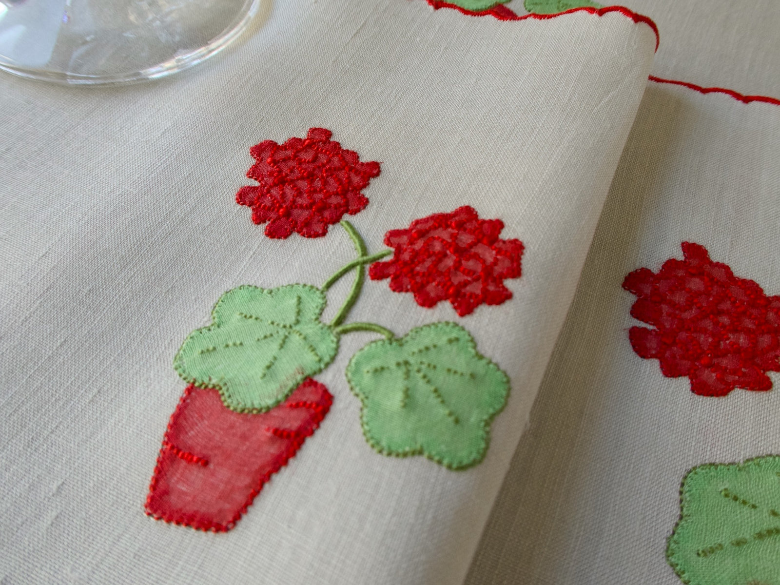 Closeup of "Geranium" in Red Marghab Linen Cocktail Napkins