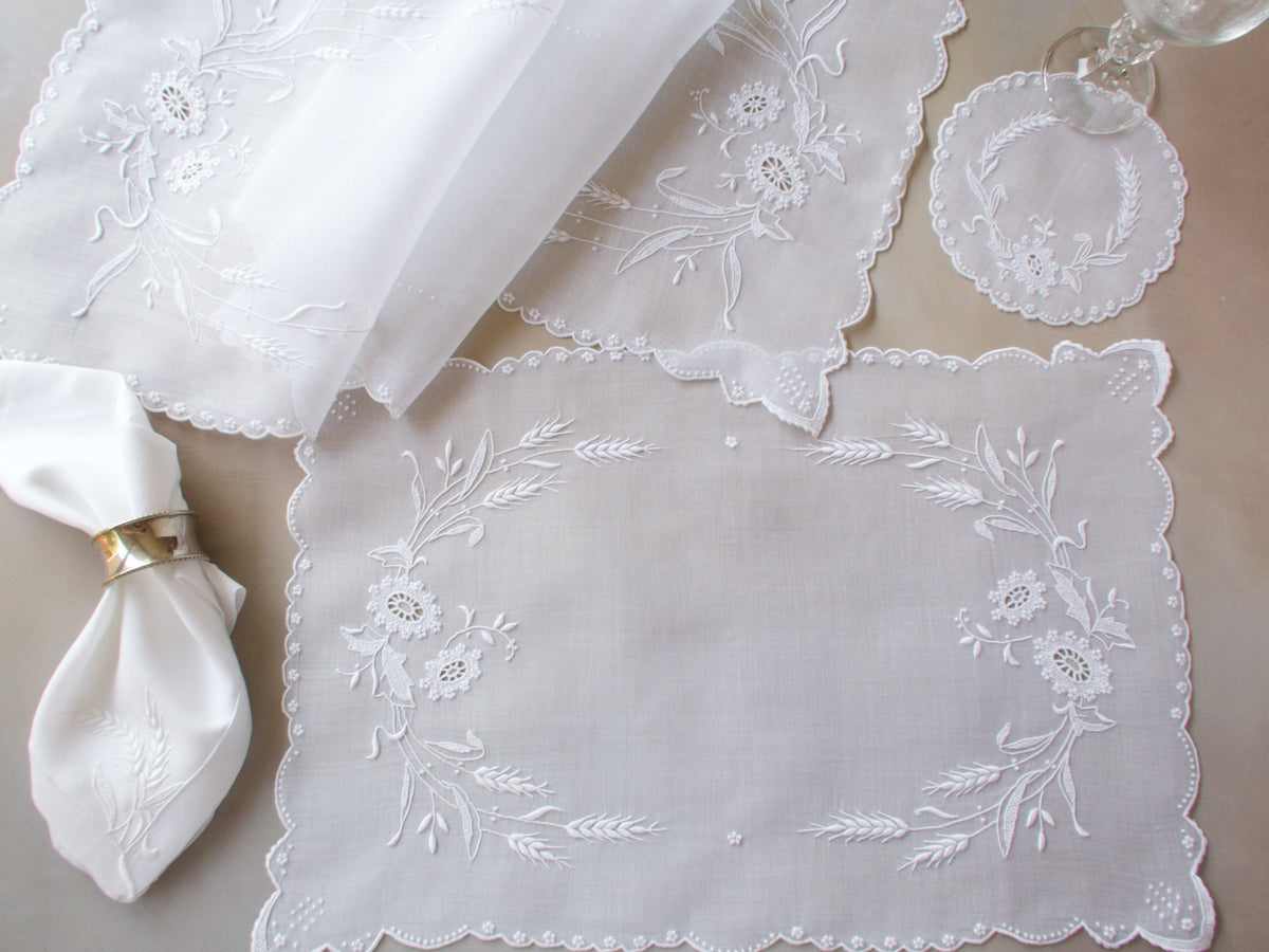 Marghab Wheat white organdy placemat, vintage Madeira handwork.