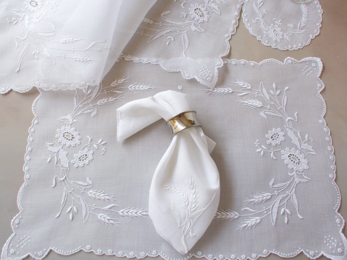 Marghab Wheat white organdy placemat, vintage Madeira handwork.