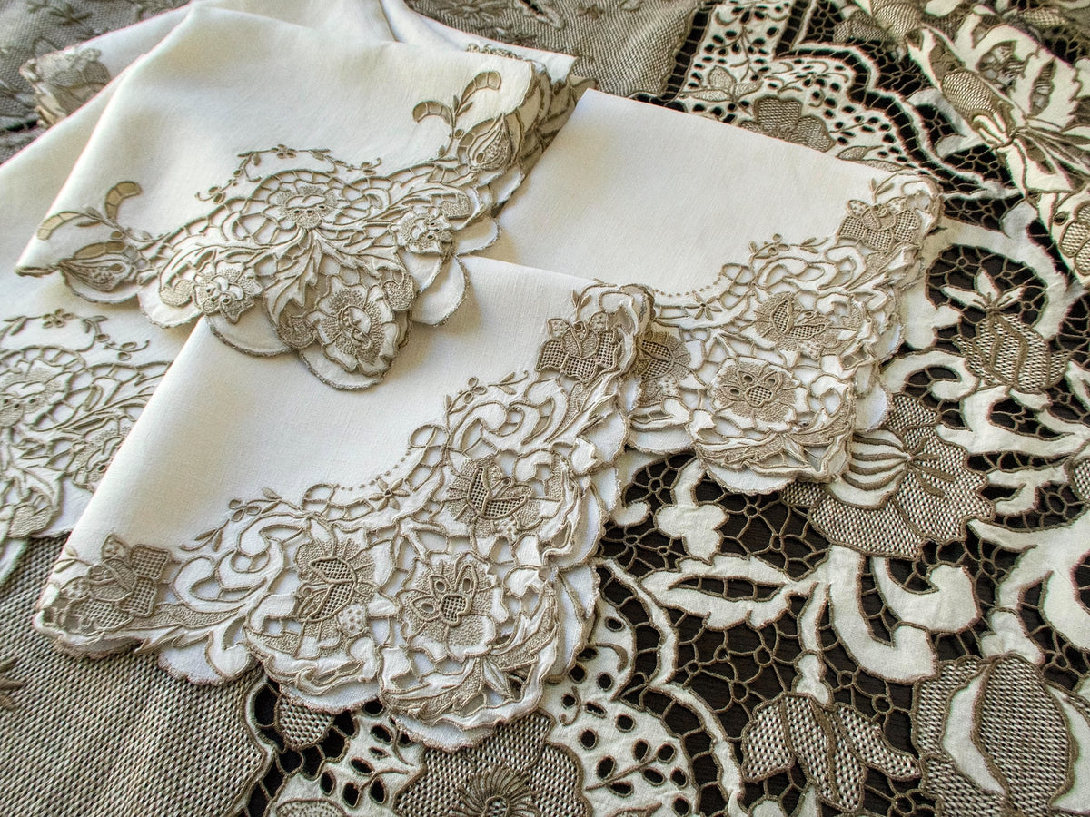 Madeira Richelieu tablecloth shown with complementary napkins, offered separately.