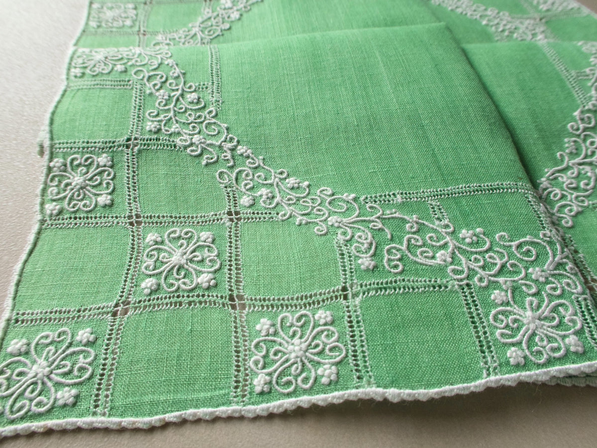 Vintage Marghab “Wreath Over Square” handkerchief, hand embroidered in white on green linen with intricate raised stitching and fine caseado bastido edging.