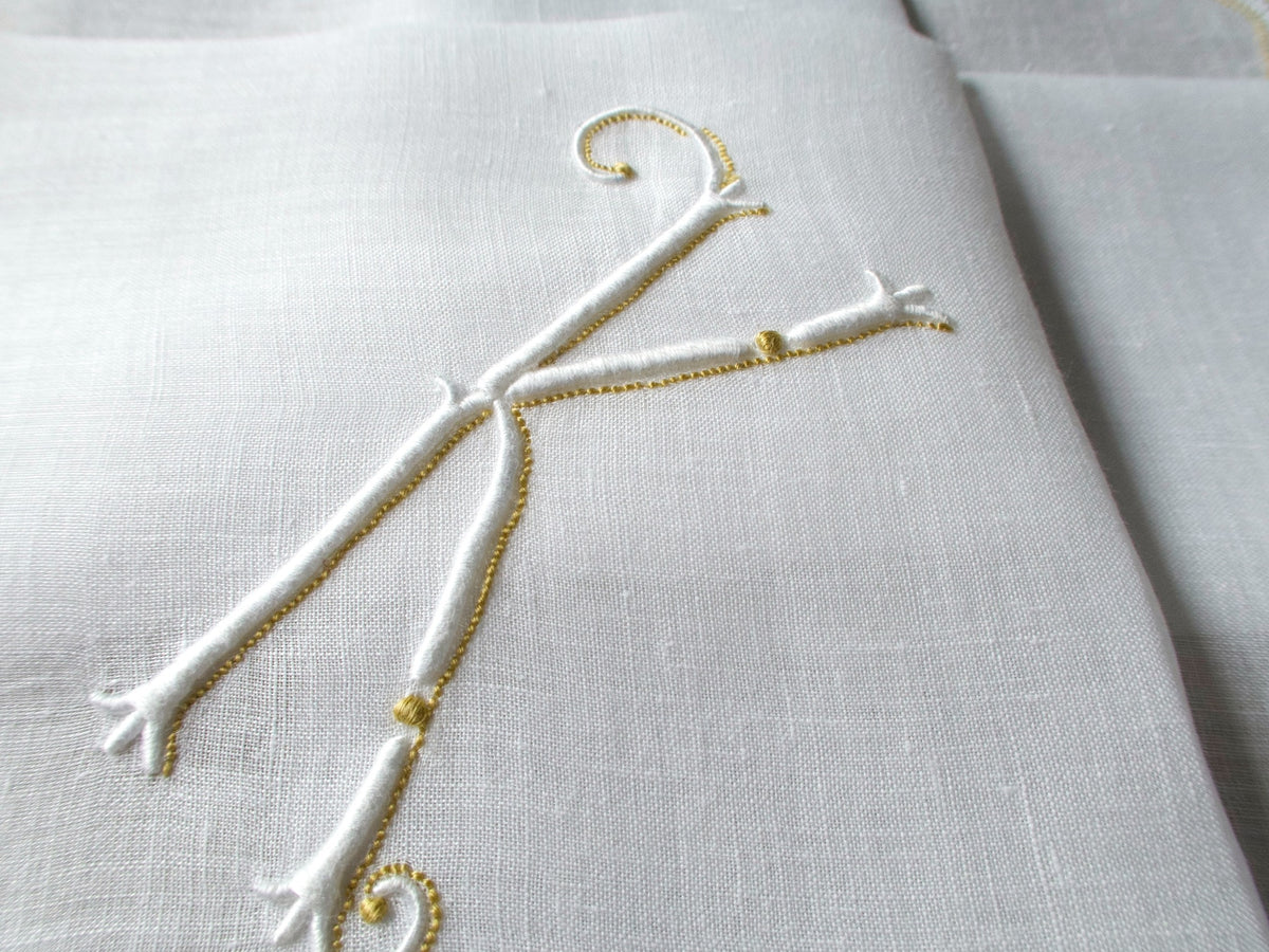 Vintage Marghab handkerchief in the “Initials” pattern, featuring a gold-embroidered “K” monogram with scalloped white border on fine linen. Hand embroidered in Madeira.