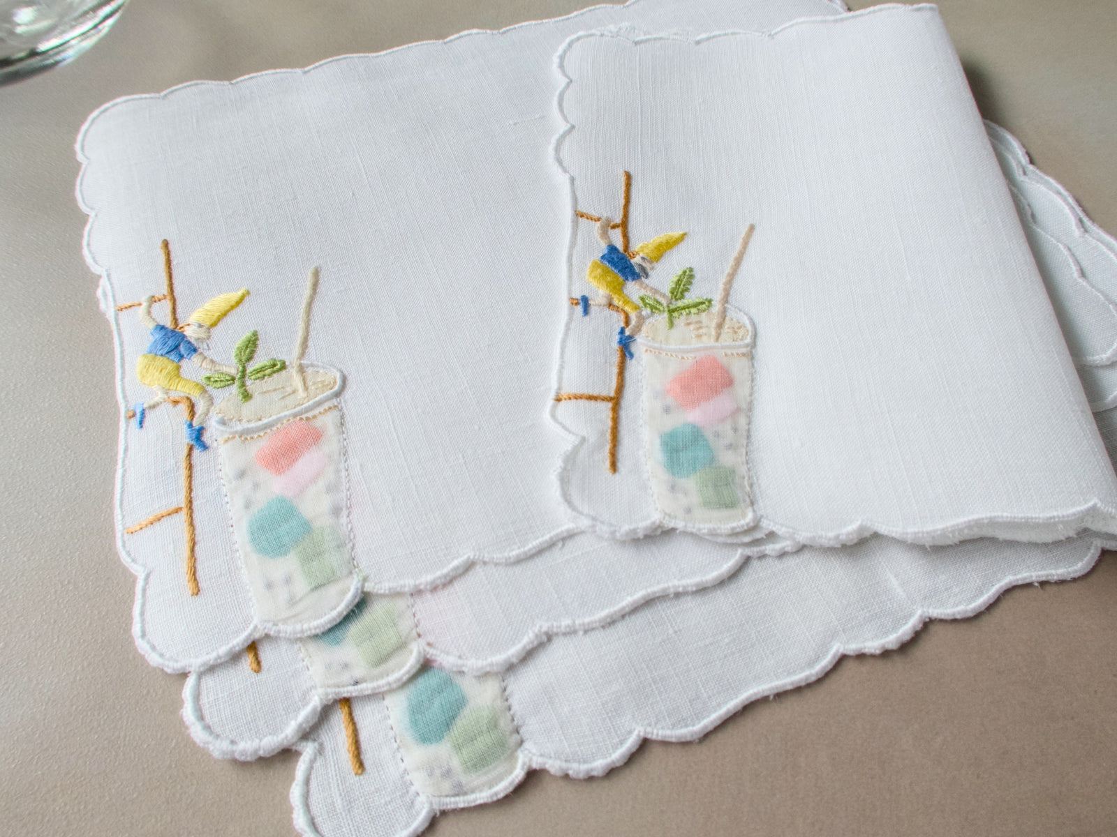 Christmas elves helping with cocktails, vintage hand embroidered Madeira cocktail napkins