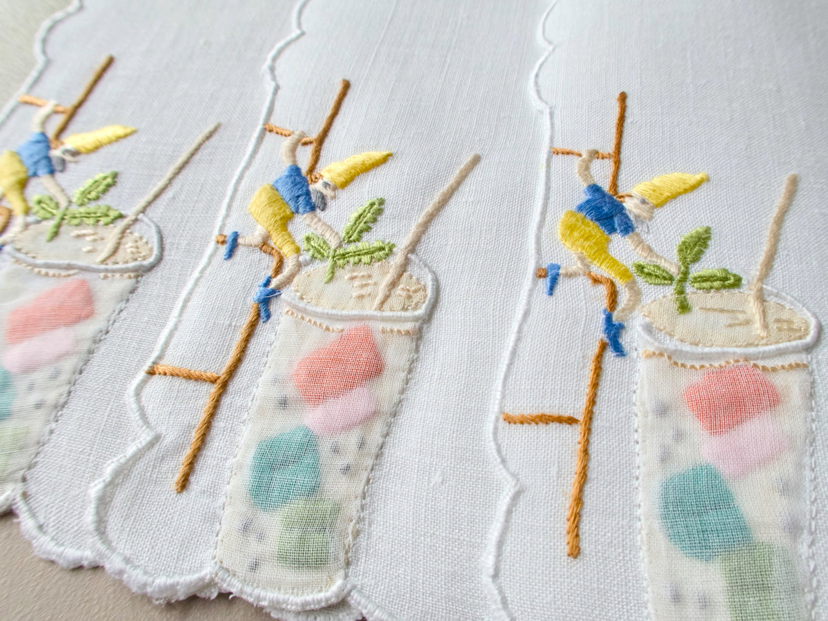 Christmas elves helping with cocktails, vintage hand embroidered Madeira cocktail napkins