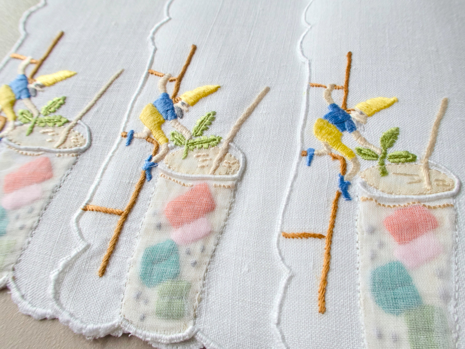 Christmas elves helping with cocktails, vintage hand embroidered Madeira cocktail napkins