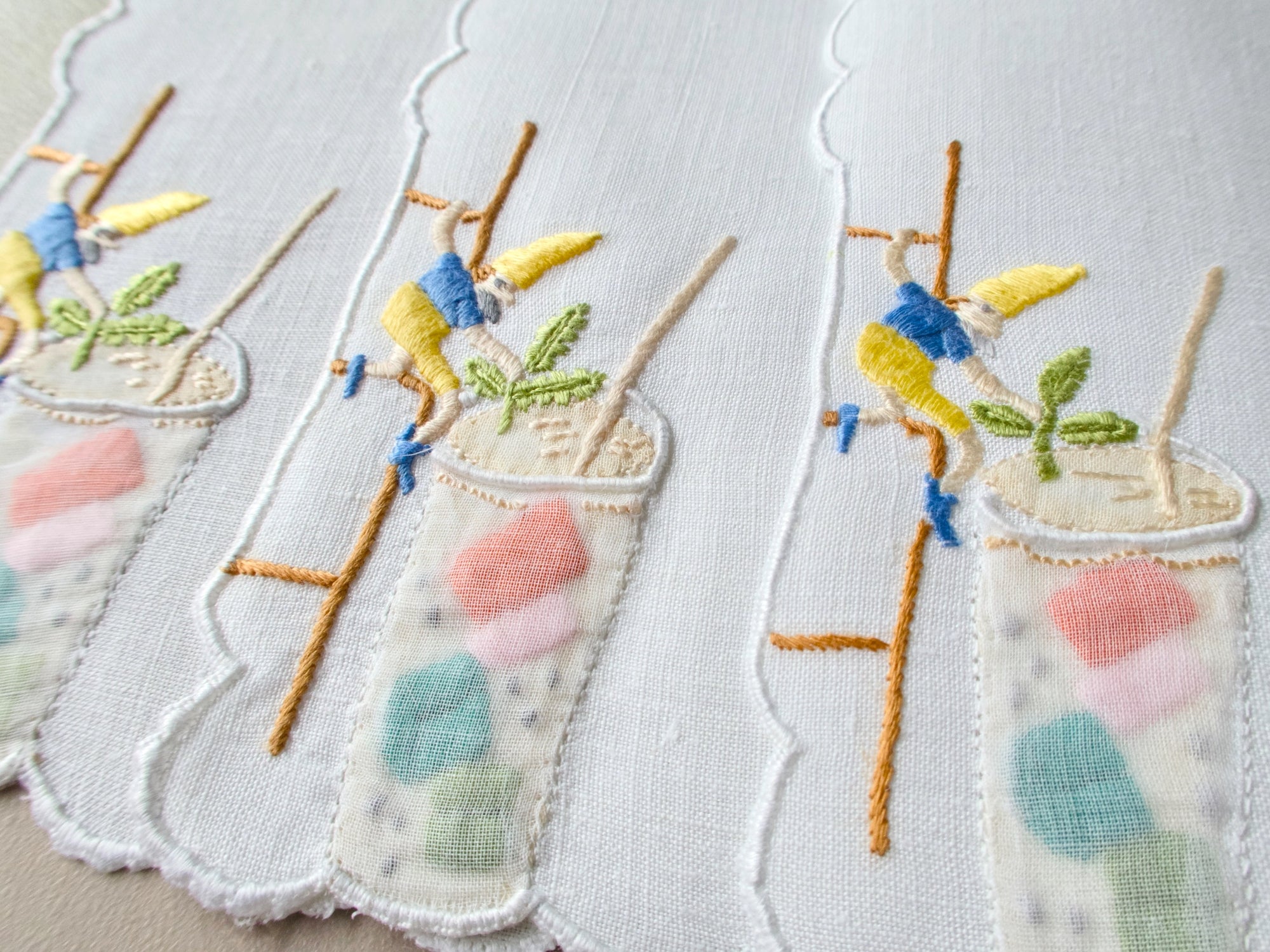 Christmas elves helping with cocktails, vintage hand embroidered Madeira cocktail napkins