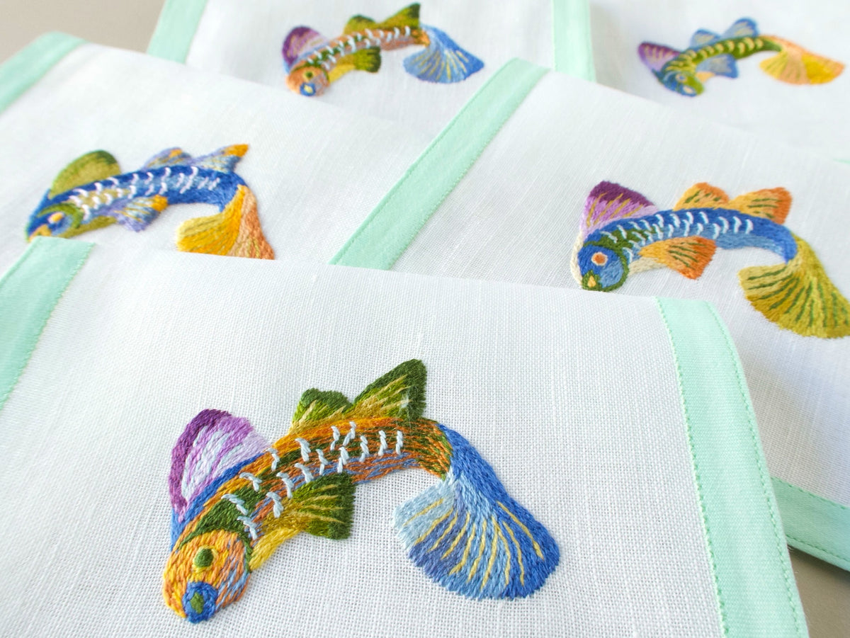 Vintage Léron cocktail napkins, set of 12, colorful tropical fish hand embroidered on fine linen with celadon green border, Madison Avenue New York label.