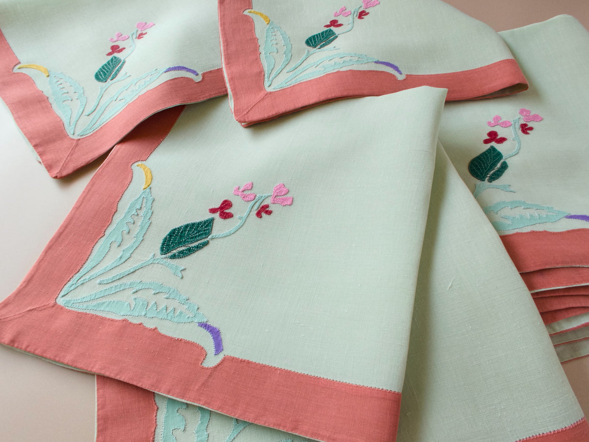Vintage French linen napkins folded, sage and coral colorway, D. Porthault 1950s style appliqué work