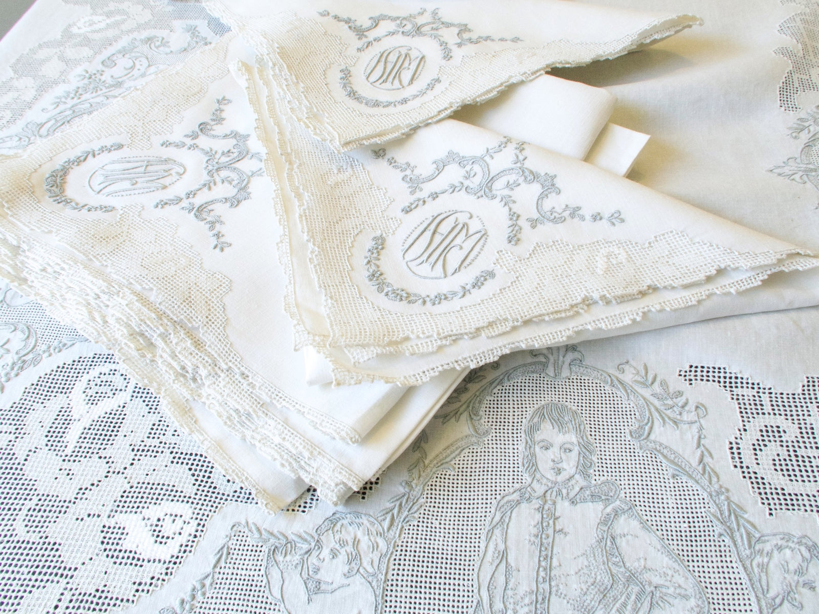 Monogrammed Appenzell linen napkins with triple monogram, Blue Boy Gainsborough portrait detail below