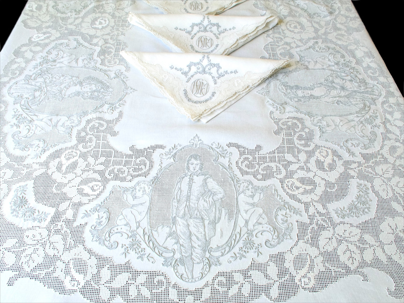Blue Boy panel with monogrammed napkins, Gainsborough Appenzell linen tablecloth detail
