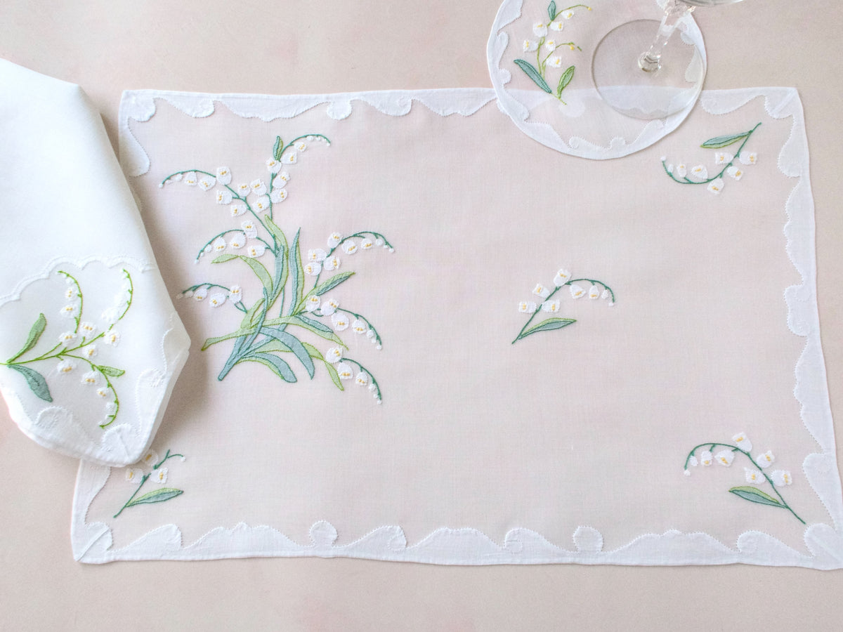 Lily of the Valley vintage Madeira placemat and napkin shown together, hand embroidered shadow work on organdy.