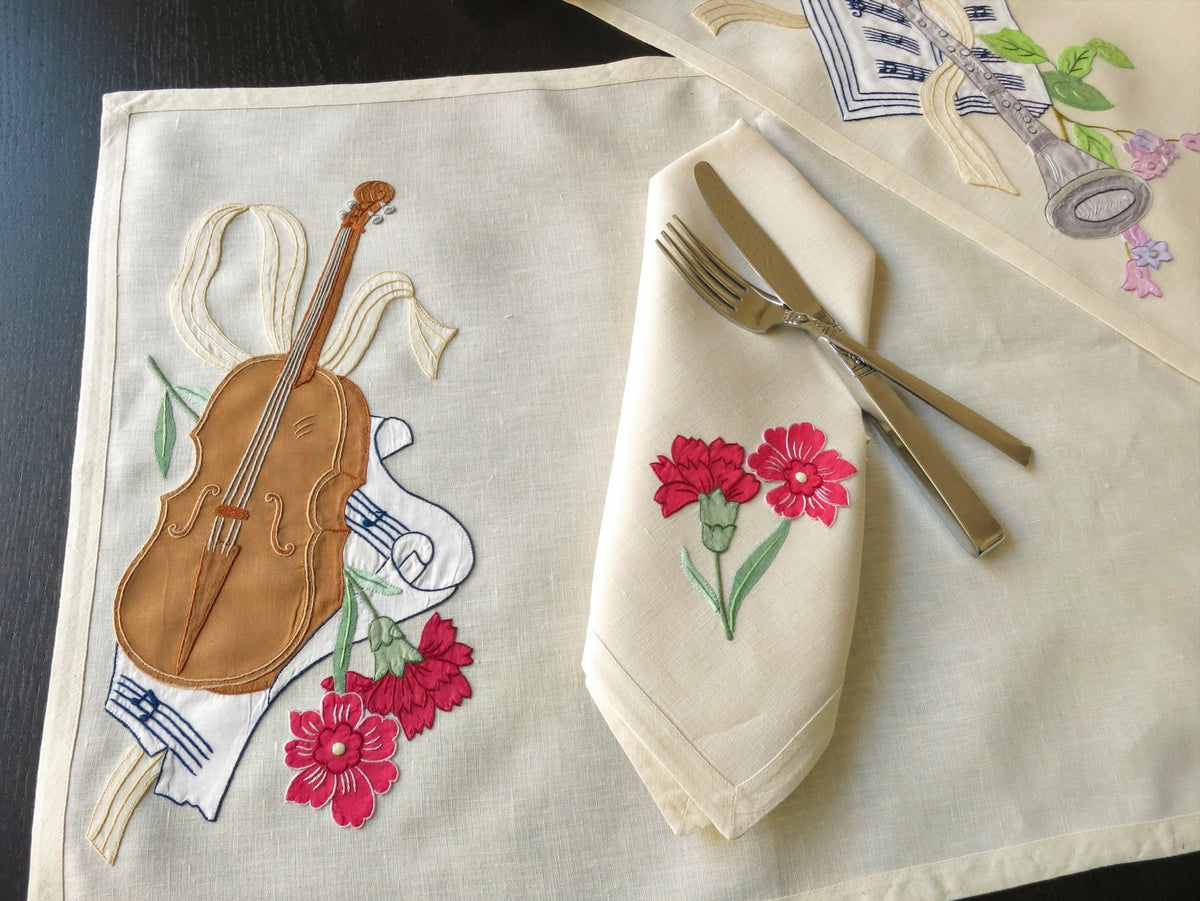 Vintage Italian embroidered placemat with musical instrument and flowers