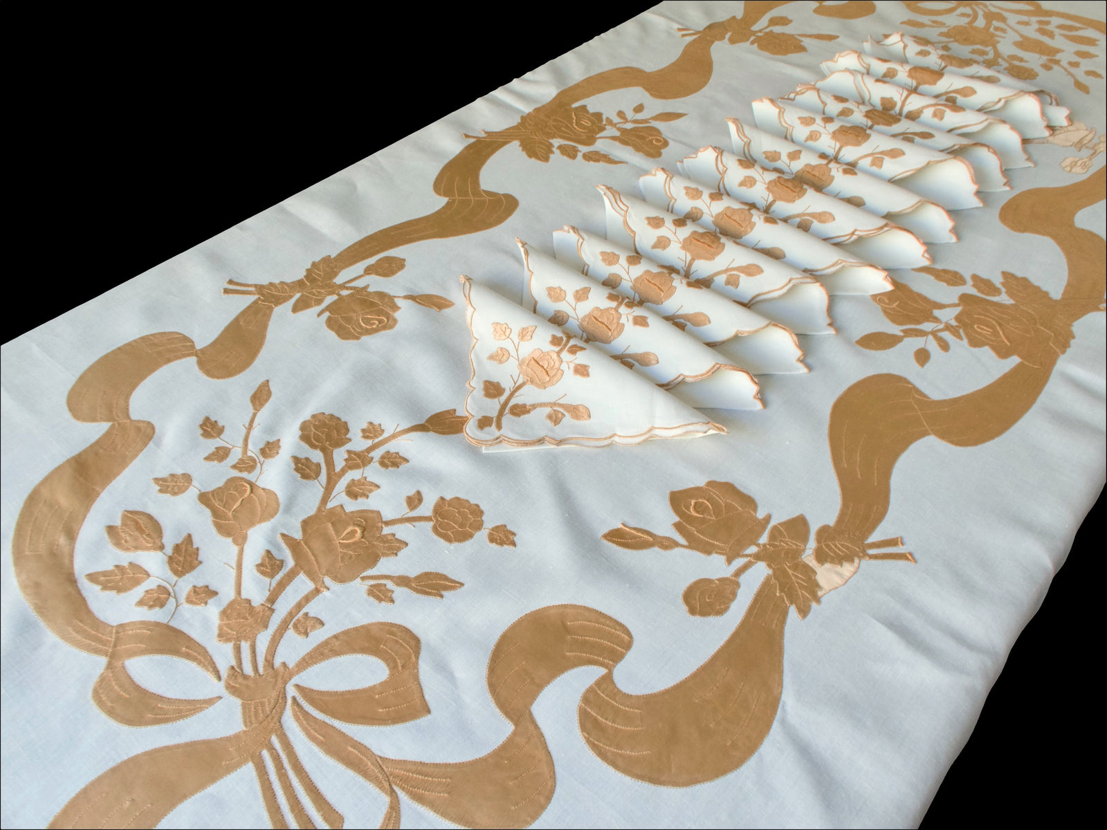 Vintage Madeira linen tablecloth with satin appliqué roses and ribbon design
