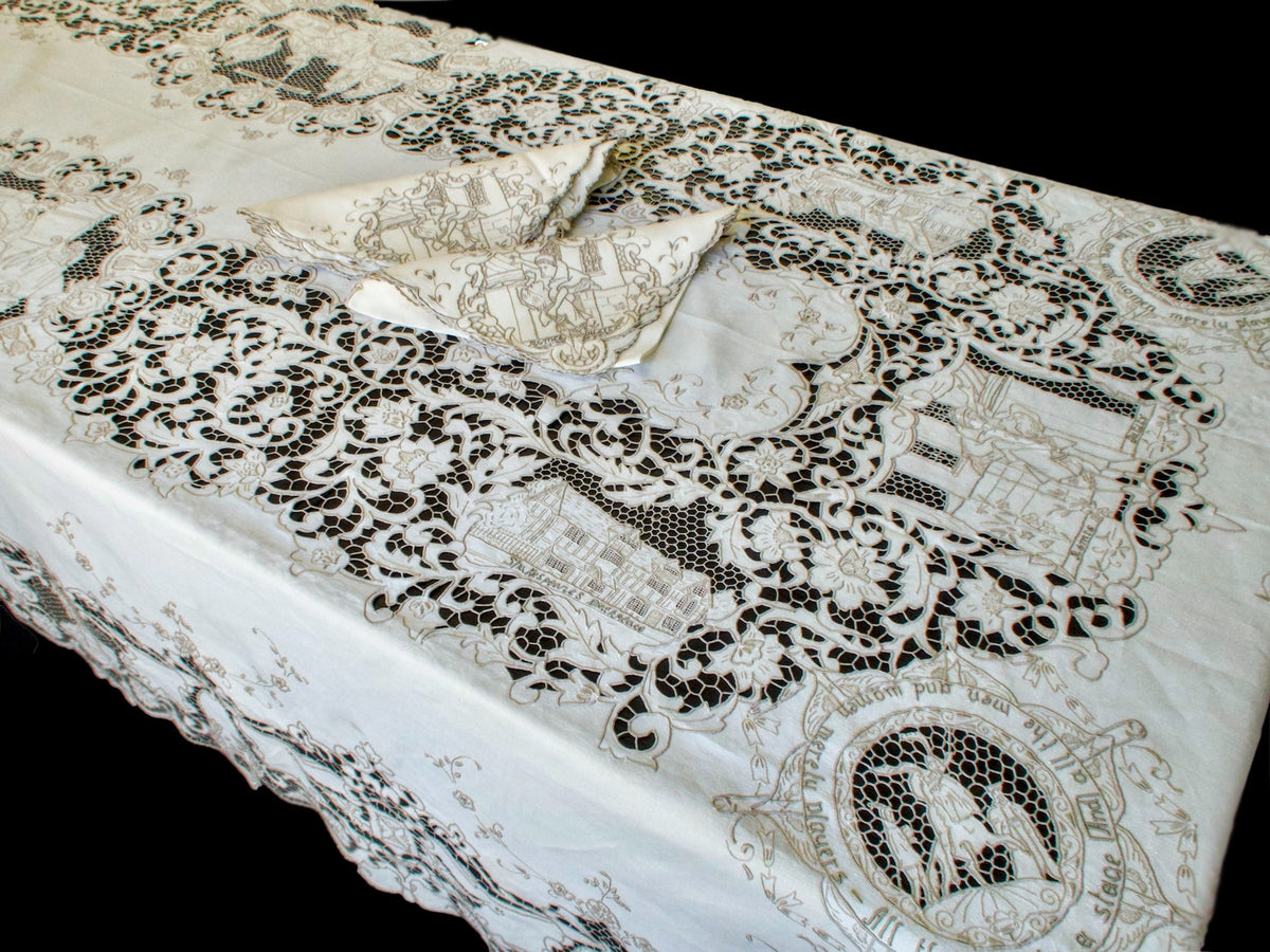  Vintage Madeira tablecloth with hand-embroidered Shakespeare scenes and Romeo &amp; Juliet balcony motif.

