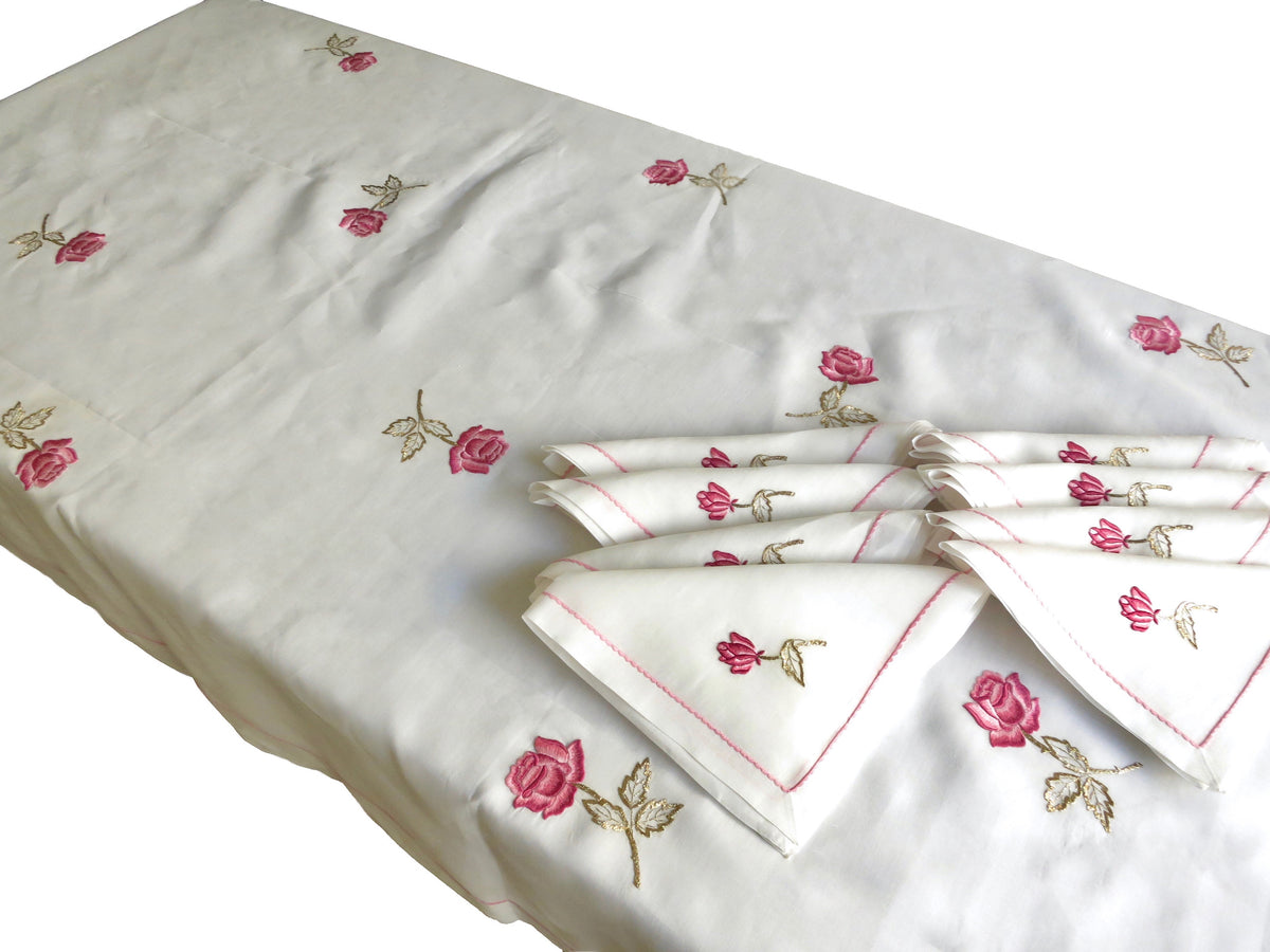 Set of eight vintage European cotton batiste napkins hand embroidered with pink roses and intricate pink embellished borders, fanned out